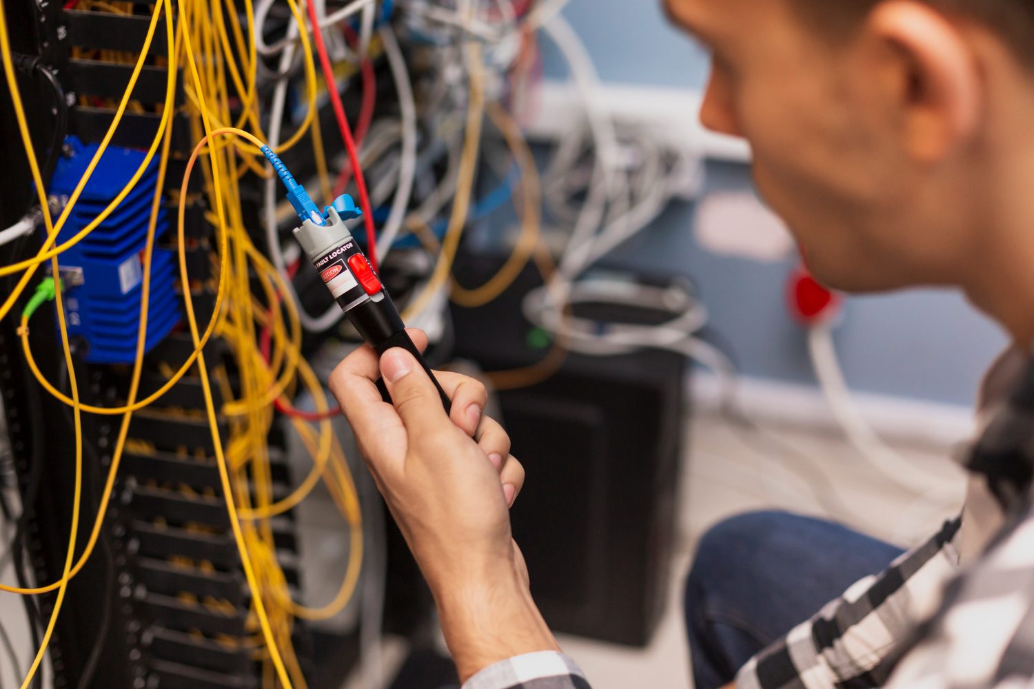 engineer-man-testing-optical-fiber engineer-man-testing-optical-fiber