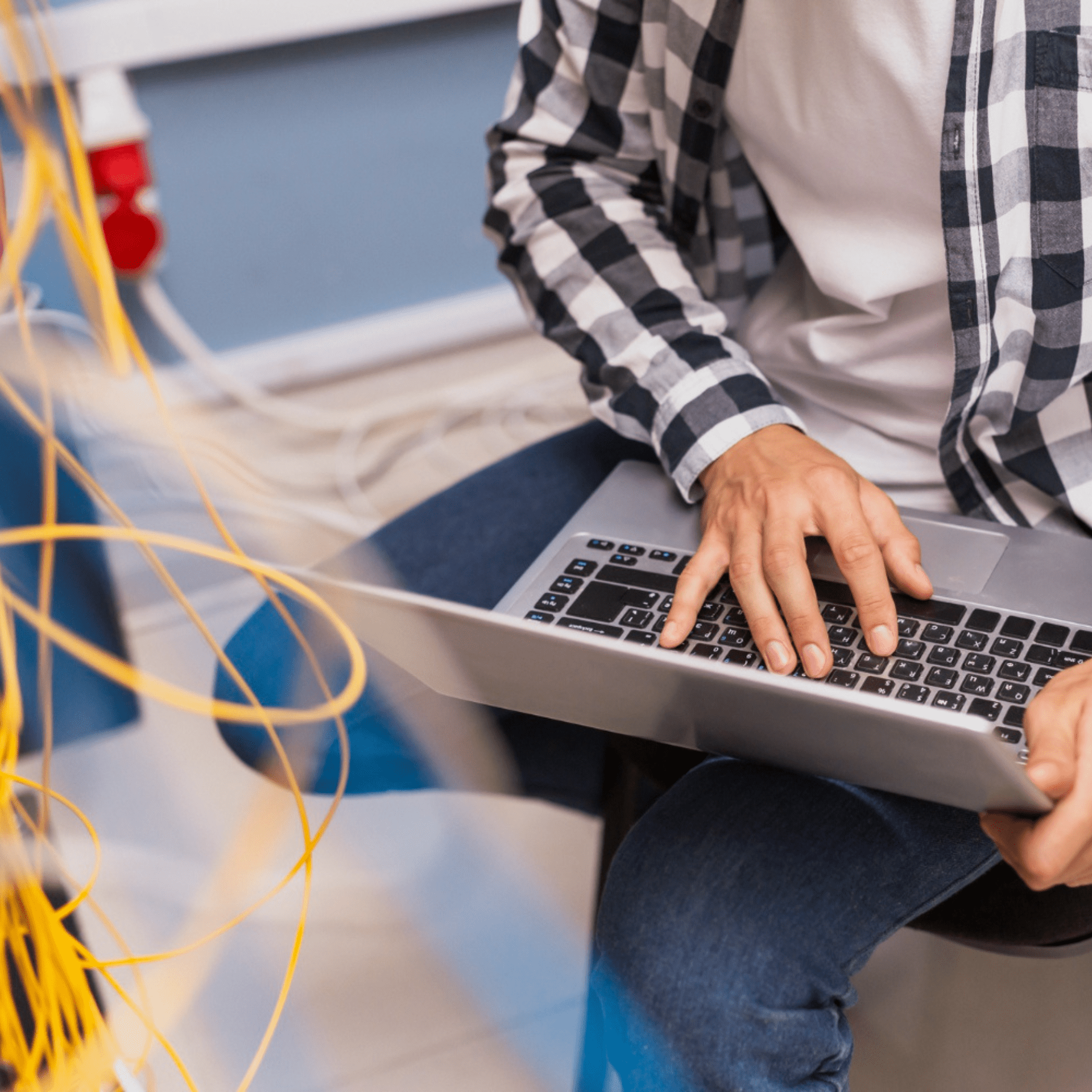 Untitled design person working on a laptop high angle view